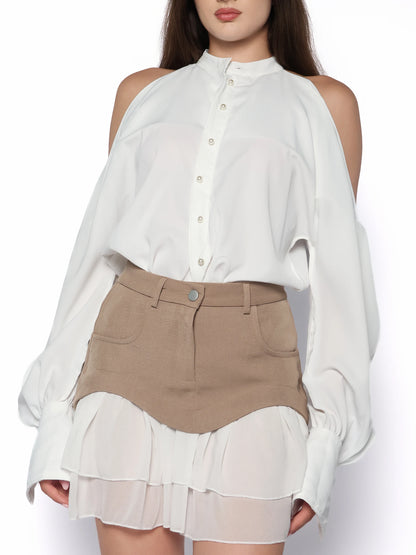 Bluza cu maneci despicate, Dolores